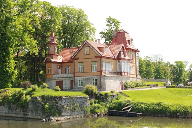 Mansion surrounded by huge green trees